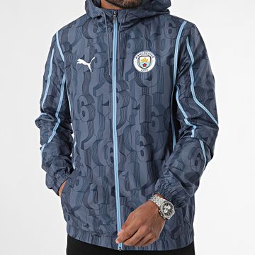 Puma - Giacca a vento Manchester City Prematch 777580 Blu Grigio