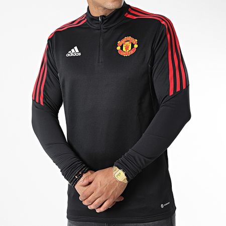 Adidas Sportswear - Manchester United H64013 Maglietta nera a maniche lunghe con strisce