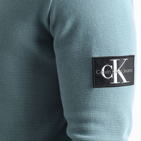 Calvin Klein - Felpa girocollo Monogram Badge Waffle 3485 Azzurro