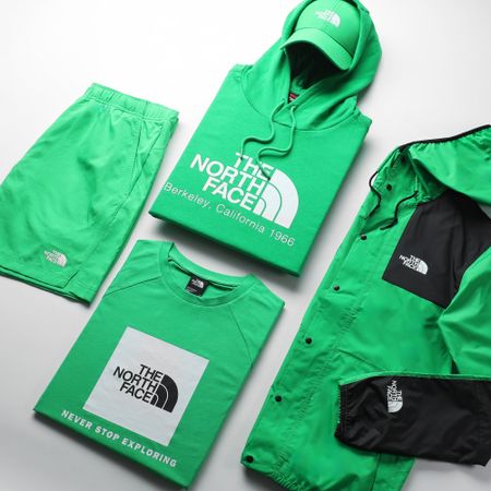 The North Face - Giacca a vento verde montagna con cappuccio