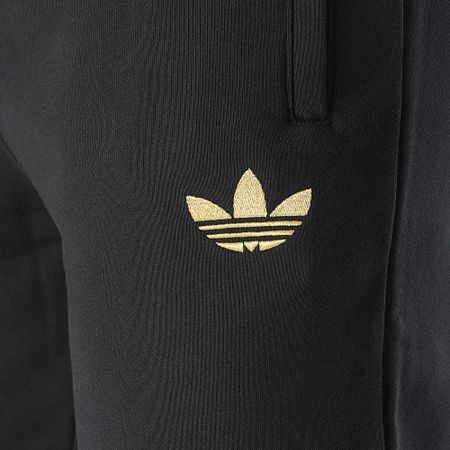 Adidas Sportswear - Pantaloni da jogging del Manchester United JF0361 Nero Oro