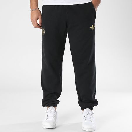 Adidas Sportswear - Pantaloni da jogging del Manchester United JF0361 Nero Oro
