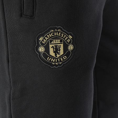 Adidas Sportswear - Pantaloni da jogging del Manchester United JF0361 Nero Oro